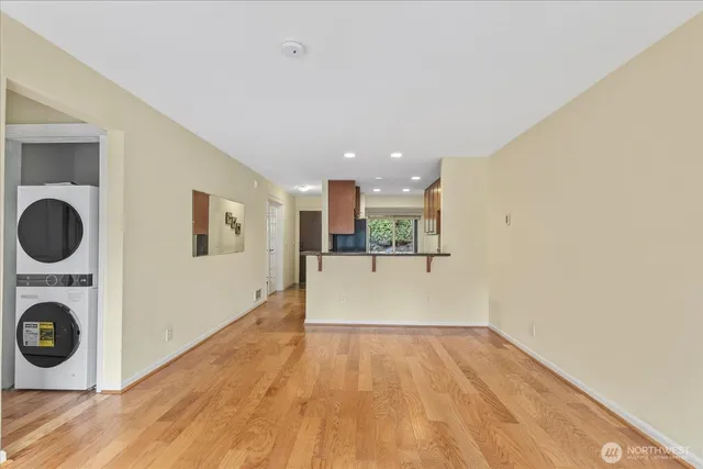 a view of a storage & utility room with wooden floor