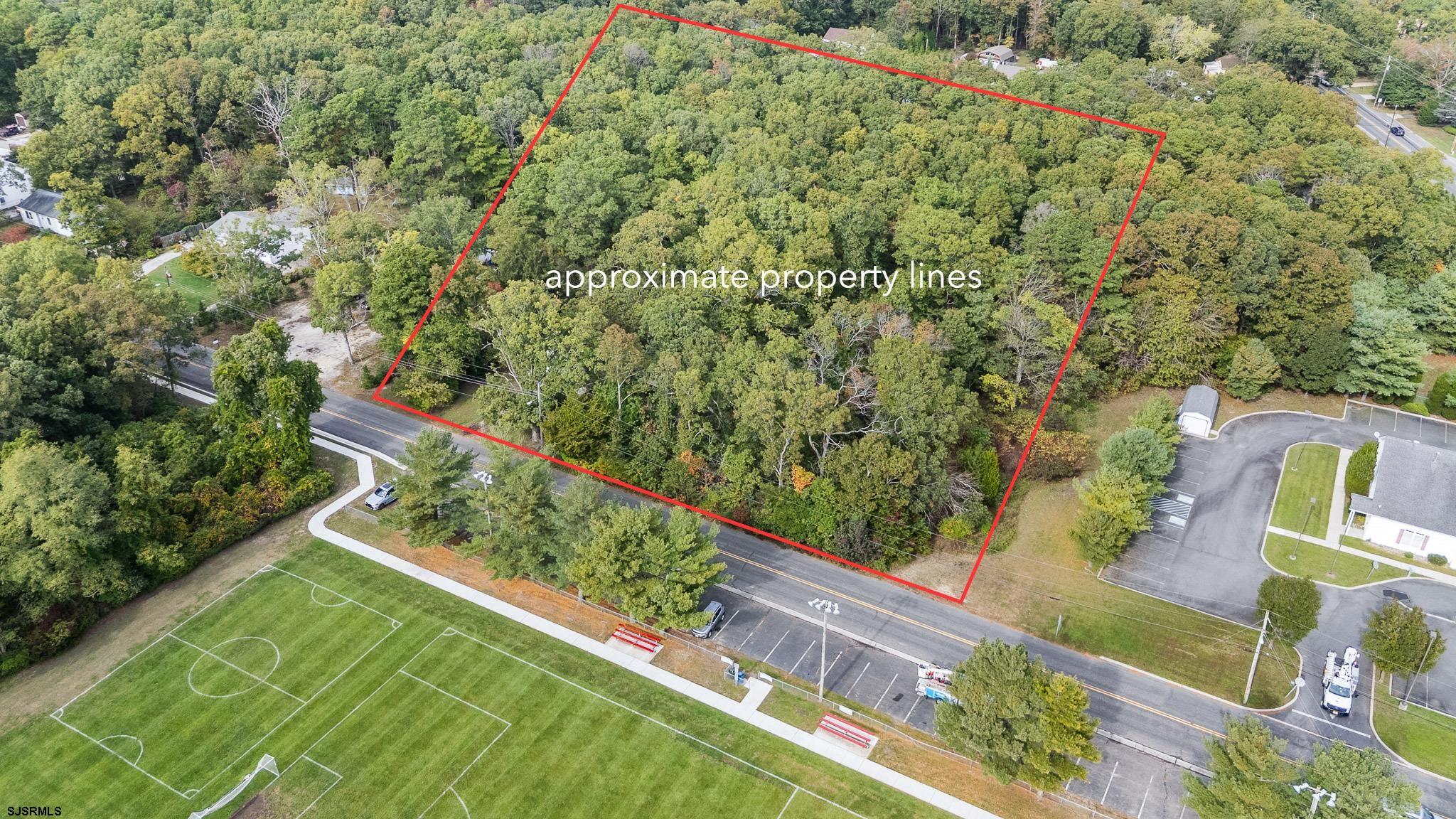 130 Crestview Avenue Absecon, NJ 08201 - Photo 3 of 13 a view of a yard with a tree