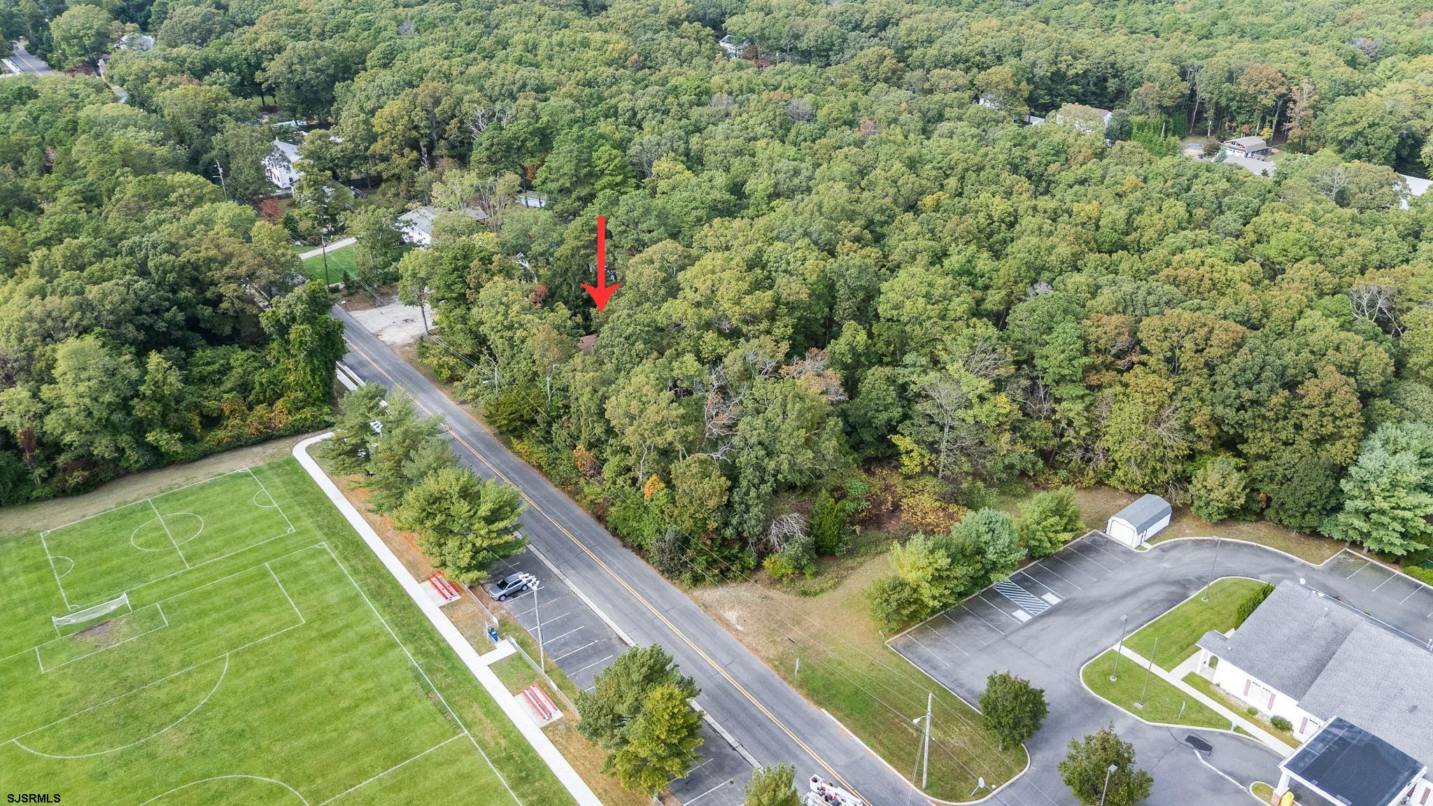 130 Crestview Avenue Absecon, NJ 08201 - Photo 4 of 13 a view of yard from deck with seating area