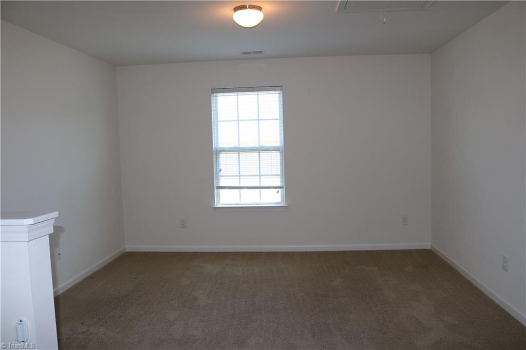 1912 Longshadow Street Rural Hall, NC 27045 - Photo 16 of 16 The loft. It would make a great office area, additional tv area, or reading nook.