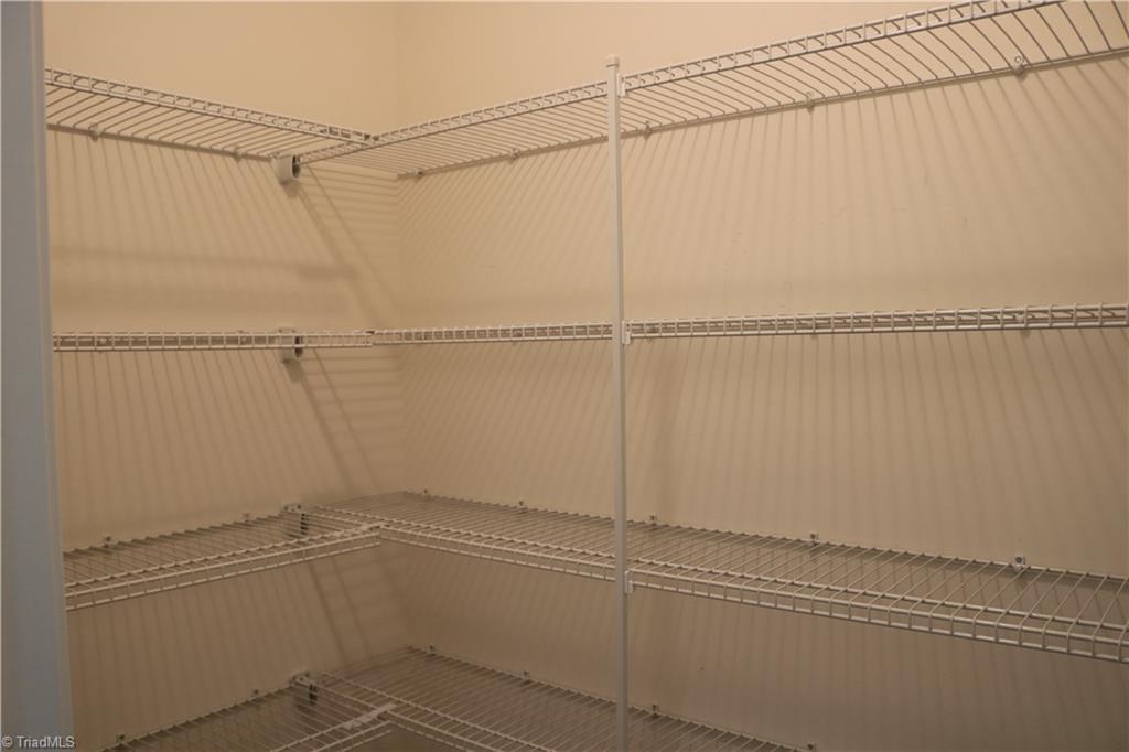 1912 Longshadow Street Rural Hall, NC 27045 - Photo 3 of 16 Walk-in pantry makes putting your groceries away so easy.