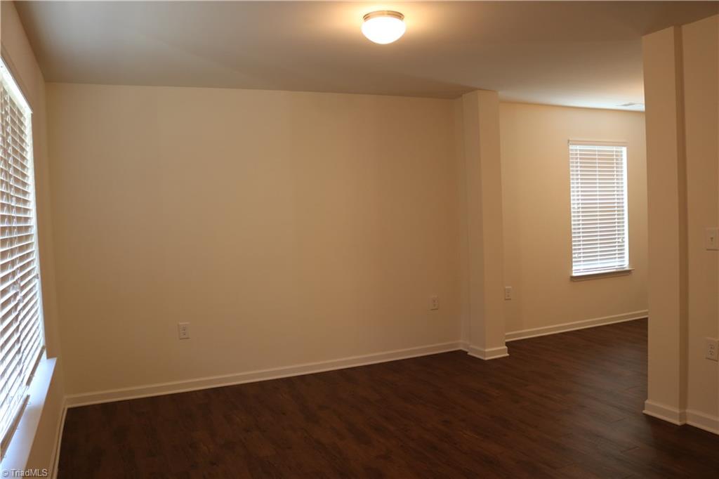 1912 Longshadow Street Rural Hall, NC 27045 - Photo 6 of 16 Family room with access to the dining room.