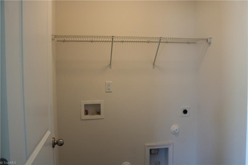 1912 Longshadow Street Rural Hall, NC 27045 - Photo 8 of 16 Main level laundry room.