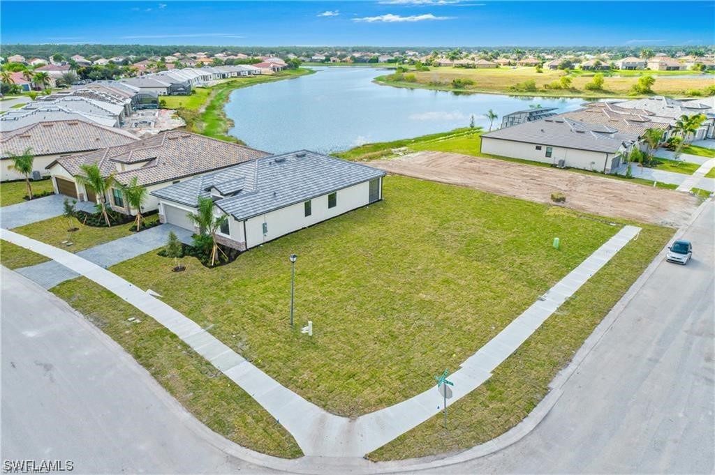 1395 Birdie Drive Naples, FL 34120 - Photo 14 of 17 a view of a lake with a ocean view