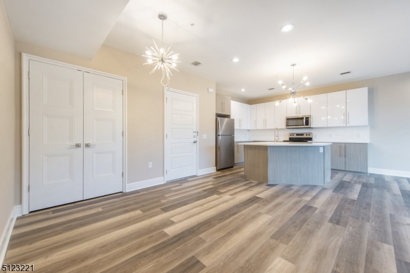 717 Preakness Avenue Wayne, NJ 07470 - Photo 13 of 19 a view of a kitchen with a sink and cabinets