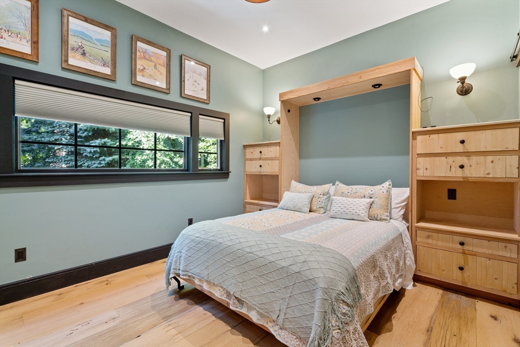 7 Brewer Street, Unit 1 Boston, MA 02130 - Photo 10 of 15 a bedroom with a bed and a window
