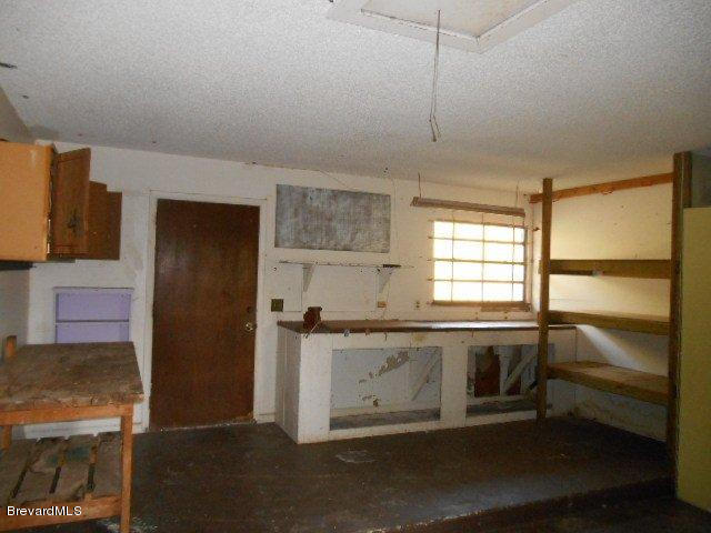 3900 Harlock Road Melbourne, FL 32934 - Photo 16 of 17 Garage with Workshop