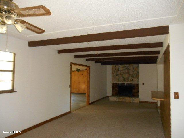 3900 Harlock Road Melbourne, FL 32934 - Photo 3 of 17 Living/Dining Room w/fireplace