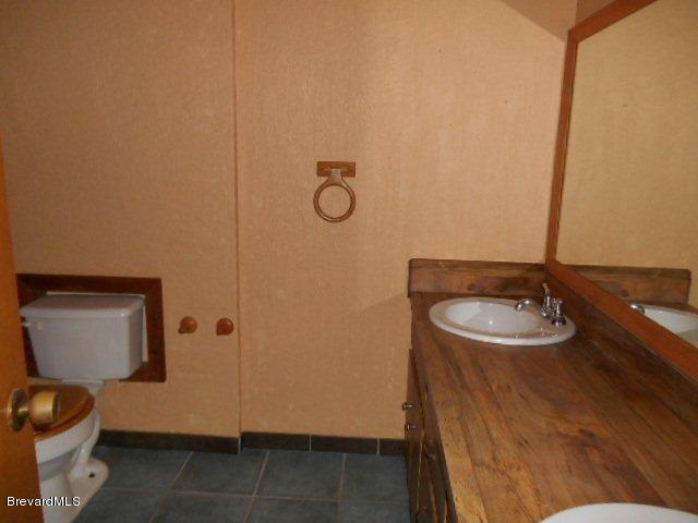 3900 Harlock Road Melbourne, FL 32934 - Photo 9 of 17 Guest Bathroom