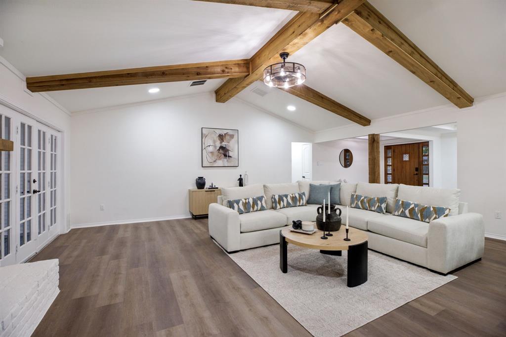 10922 Ferndale Road Dallas, TX 75238 - Photo 26 of 32 Living room featuring recessed lighting, wood finished floors, and french doors