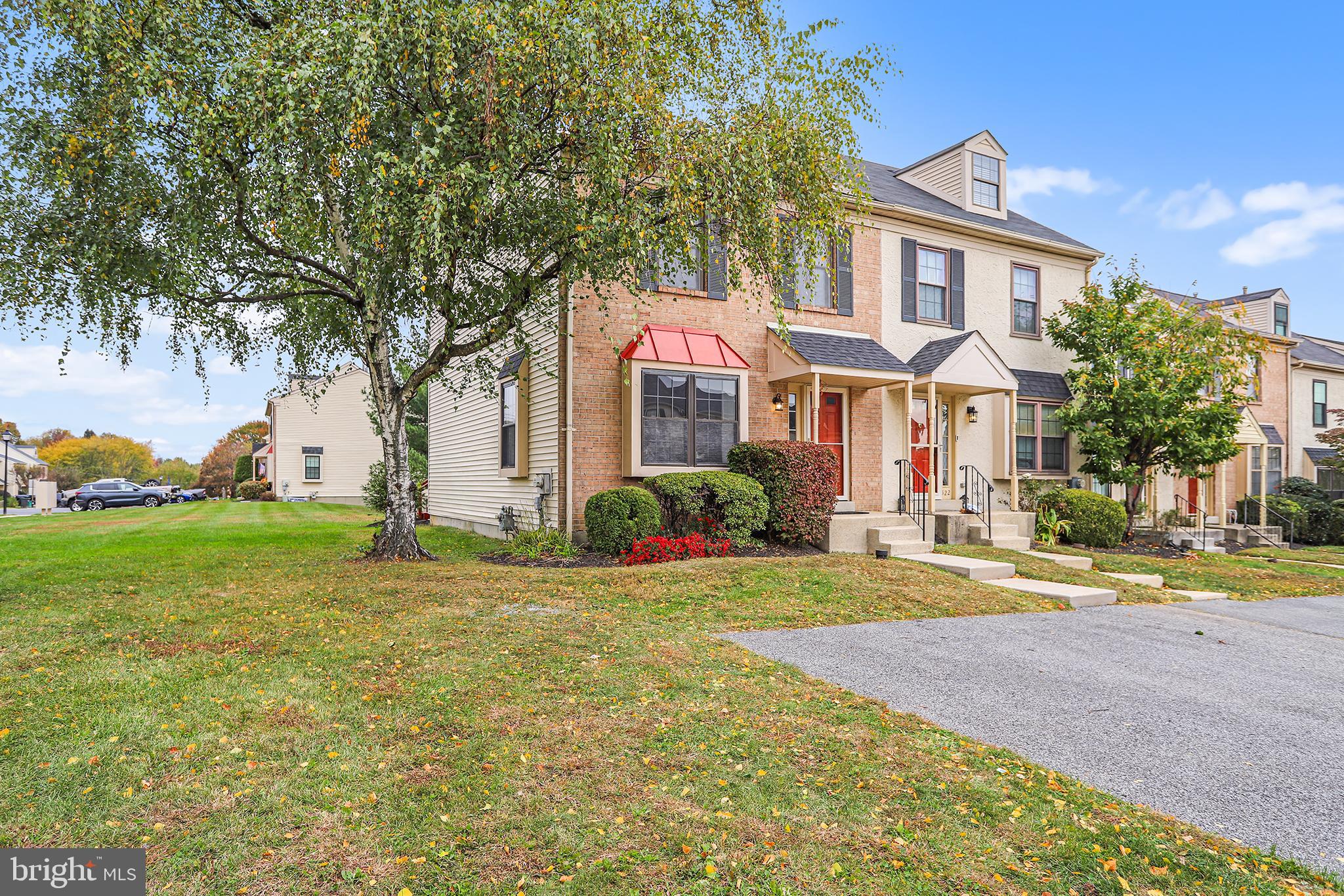 524 Ward Road Brookhaven, PA 19015 - Photo 1 of 22 a front view of a house with a yard and trees