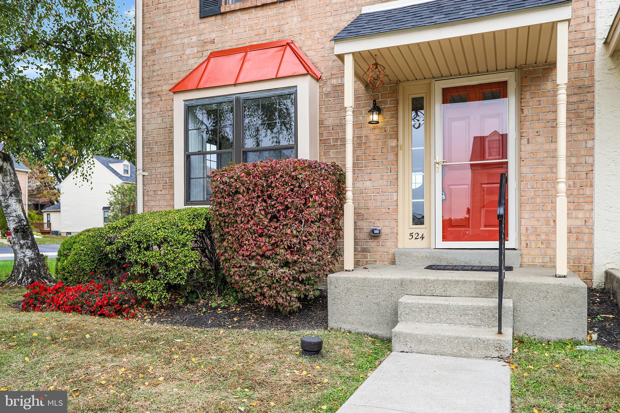 524 Ward Road Brookhaven, PA 19015 - Photo 2 of 22 a front view of a house with garden