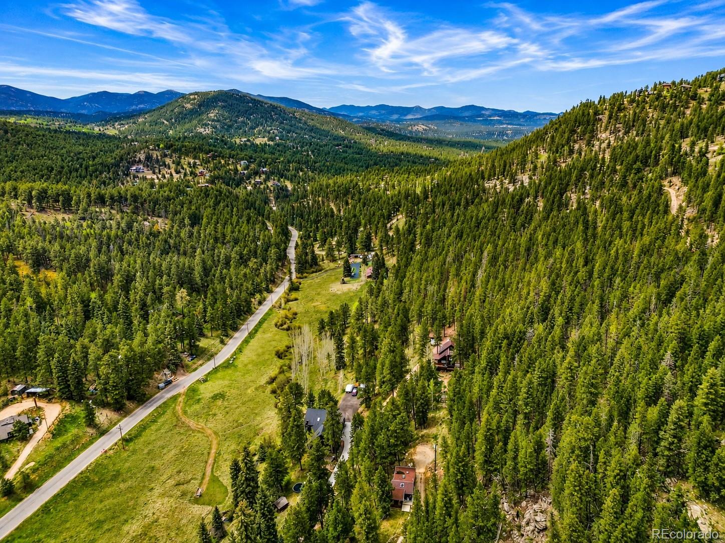 7520 South Blue Creek Road Evergreen, CO 80439 - Photo 21 of 22 a view of a city