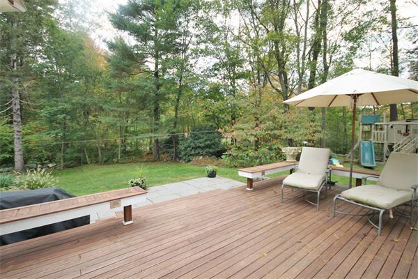 195 Conant Road Weston, MA 02493 - Photo 11 of 12 a view of a terrace with furniture and garden