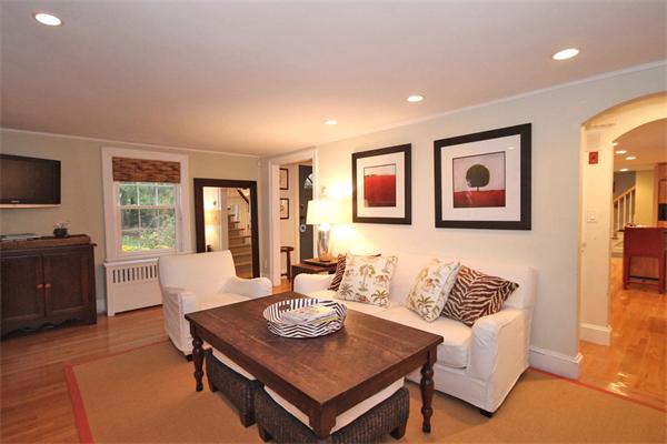 195 Conant Road Weston, MA 02493 - Photo 2 of 12 a living room with furniture and a flat screen tv