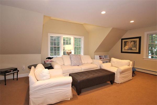 195 Conant Road Weston, MA 02493 - Photo 6 of 12 a living room with furniture and a large window