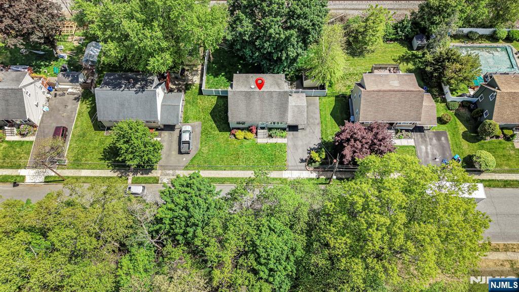 52 Barbara Drive Pompton Lakes, NJ 07442 - Photo 26 of 30 an aerial view of residential house with outdoor space and trees all around