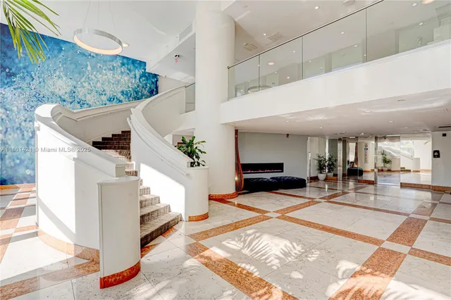 an aerial view of residential house with outdoor space and lake view