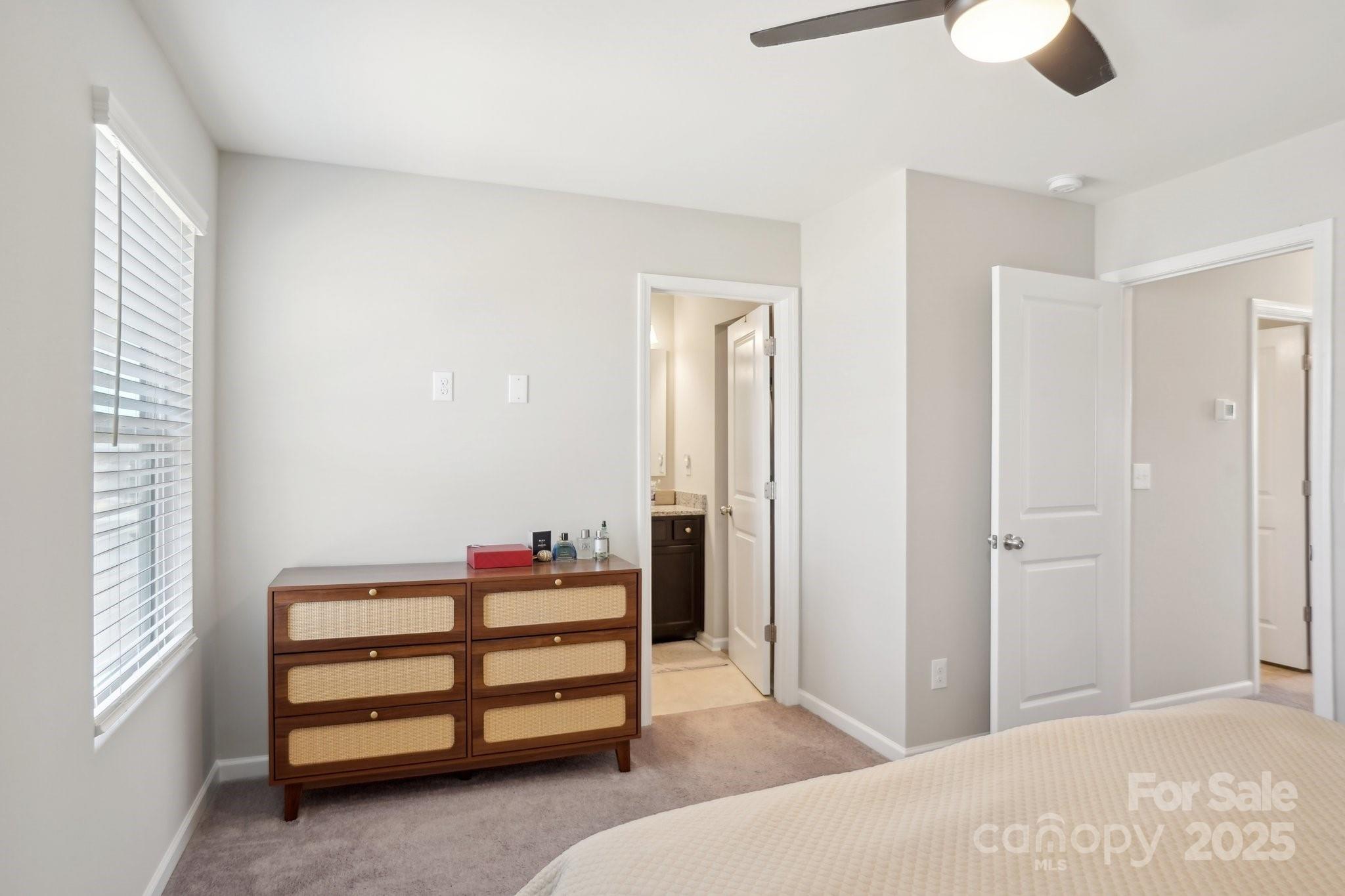 12461 Bryton Ridge Parkway Huntersville, NC 28078 - Photo 17 of 33 a bedroom with a bed and a window