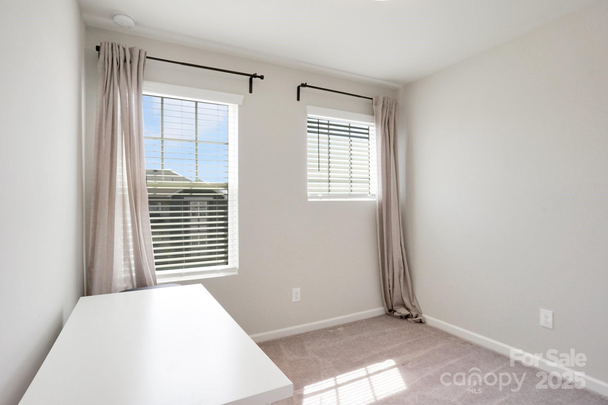 12461 Bryton Ridge Parkway Huntersville, NC 28078 - Photo 24 of 33 a view of an empty room and a window