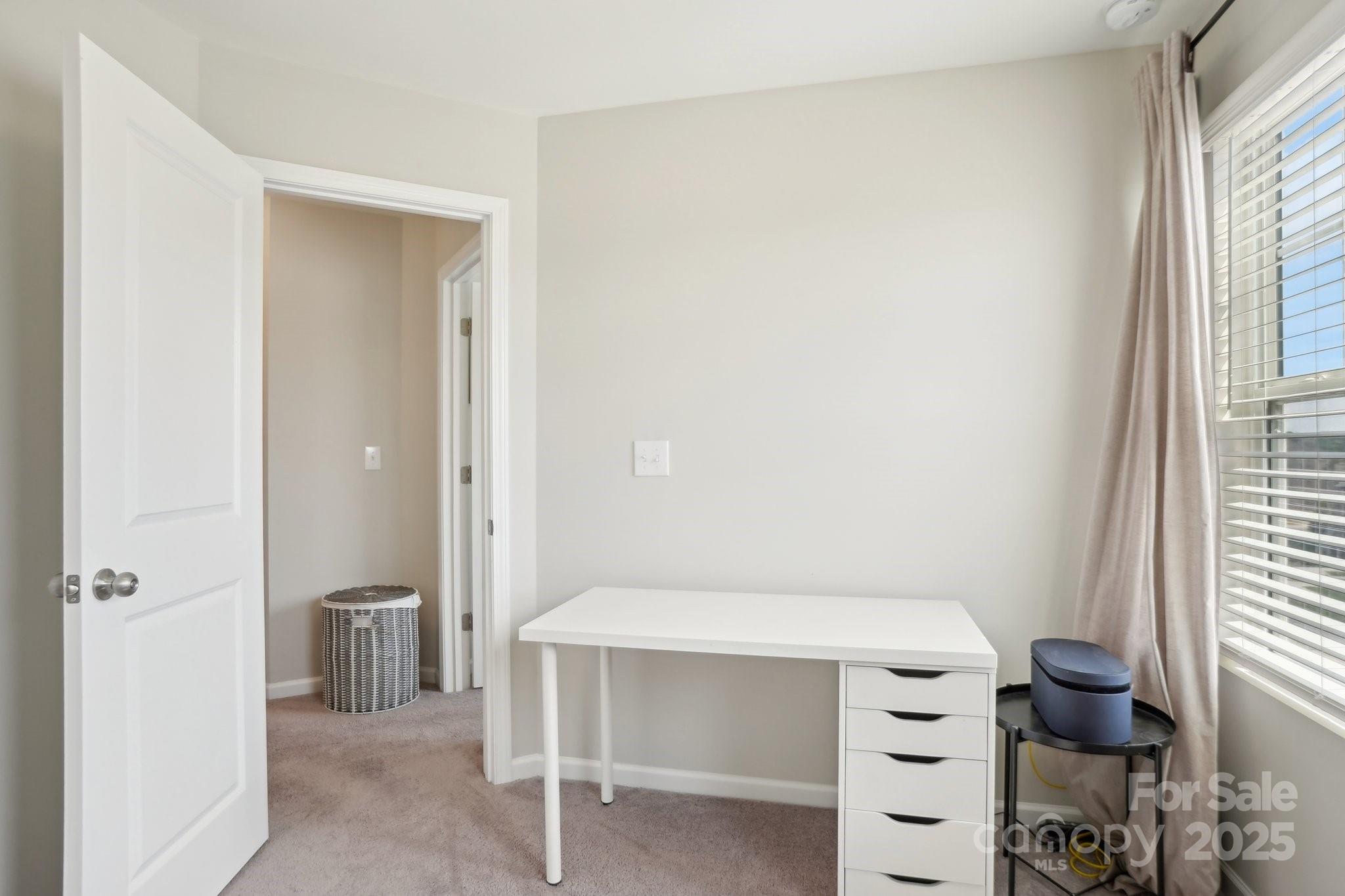 12461 Bryton Ridge Parkway Huntersville, NC 28078 - Photo 25 of 33 a bathroom with a sink and a toilet