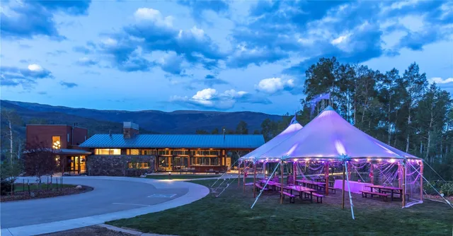 a view of a yard in front of house with a yard