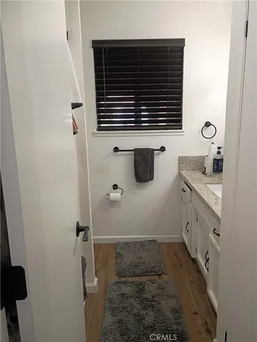 a view of wooden floor with staircase