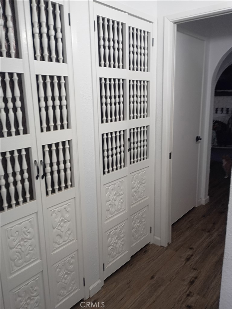 201 South Greenlawn Street Ridgecrest, CA 93555 - Photo 21 of 31 a view of wooden floor with staircase
