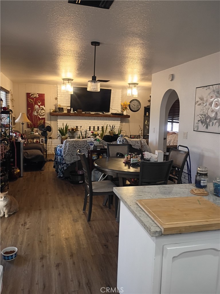 201 South Greenlawn Street Ridgecrest, CA 93555 - Photo 29 of 31 a very nice looking living room with dining room and wooden floor