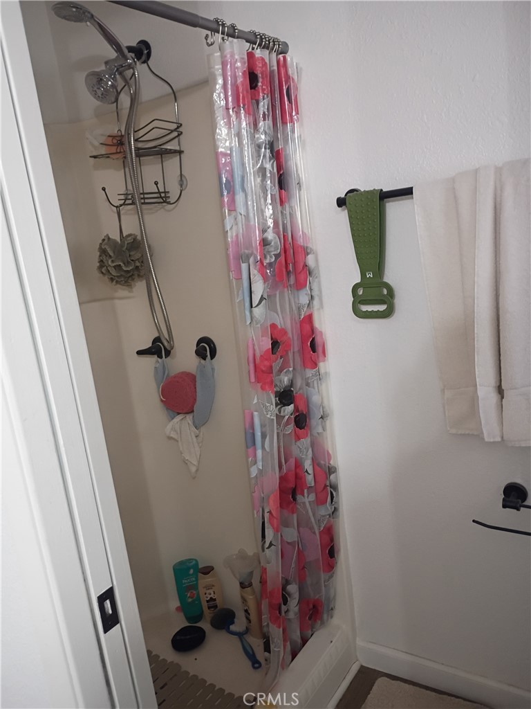 201 South Greenlawn Street Ridgecrest, CA 93555 - Photo 5 of 31 a view of storage and utility room with a window