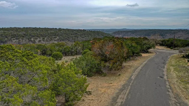 a view of a road with an ocean view