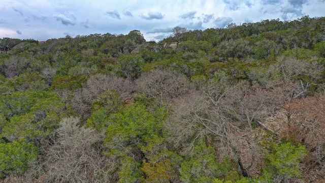 a view of a building in a field
