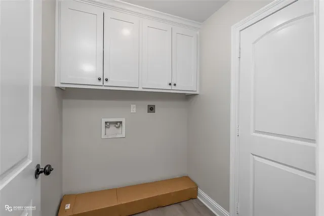 a view of room with cabinets