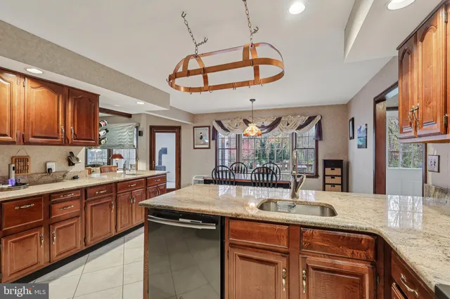 a living room with furniture and a piano
