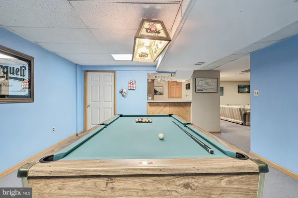 a view of a fountain in front of a house