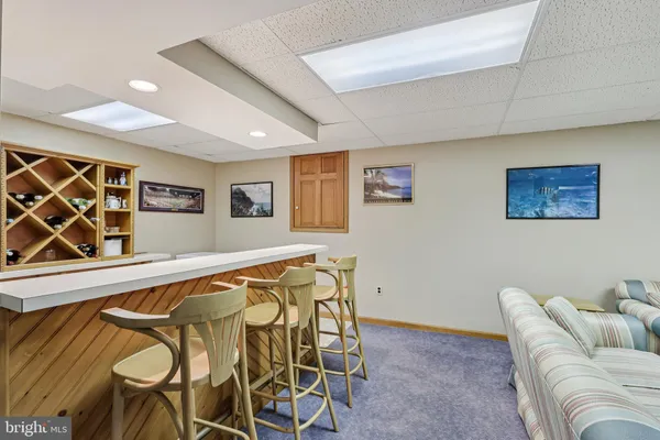 a picture of a wall with white wall with a white wall and a painting