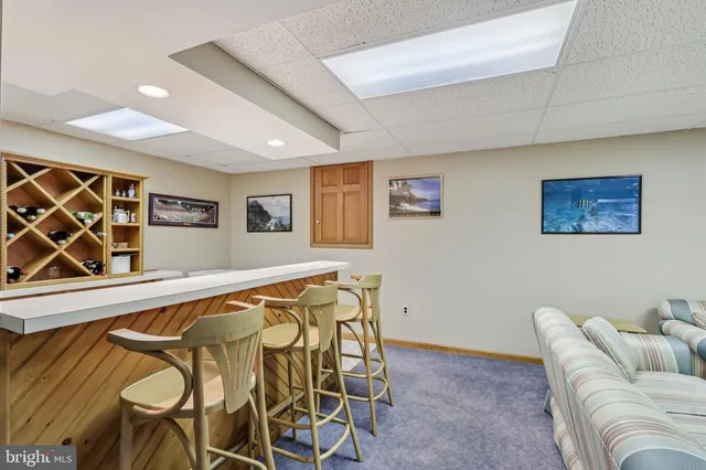 a picture of a wall with white wall with a white wall and a painting