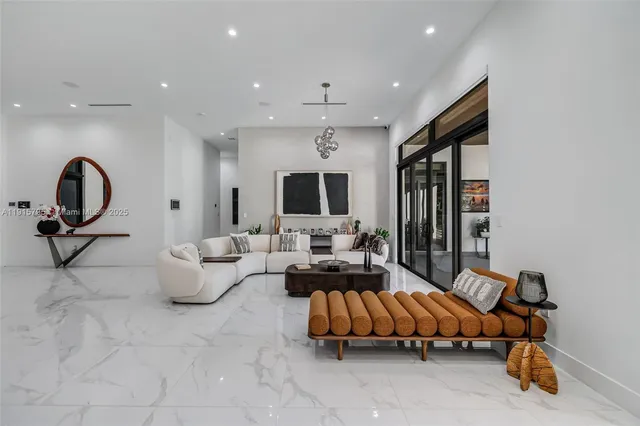 a kitchen with cabinets and chairs