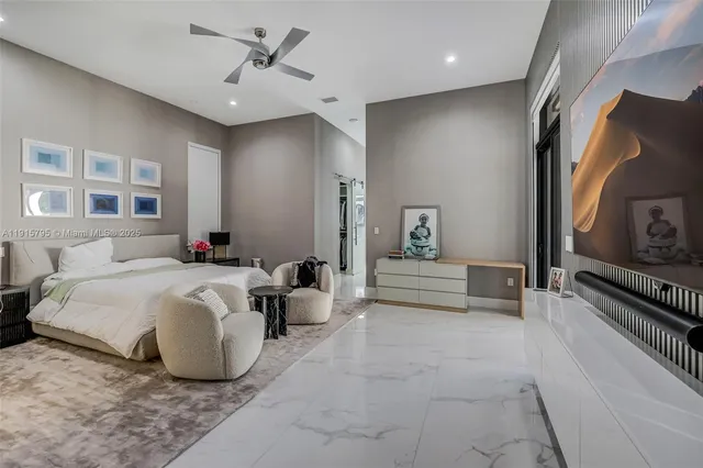 a room with furniture and flat screen tv