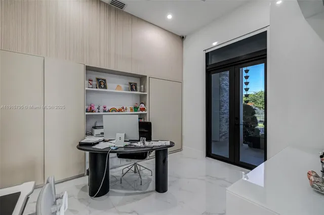 a view of a patio with table and chairs potted plants with wooden floor