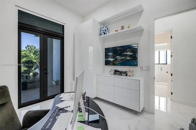 a view of a backyard with sitting area