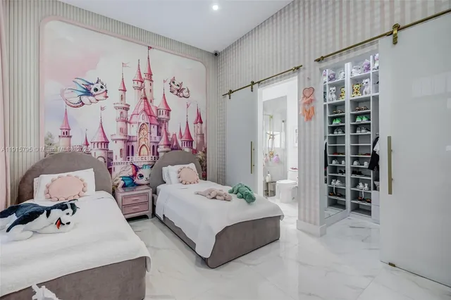 a view of a backyard with plants and outdoor seating