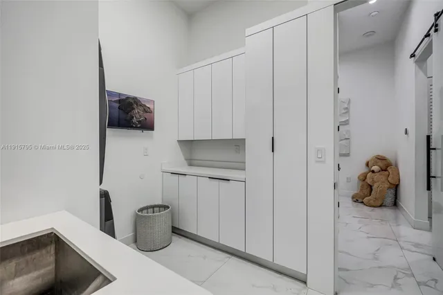 a bathroom with a toilet and a sink
