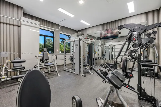 an aerial view of a house with garden space and street view