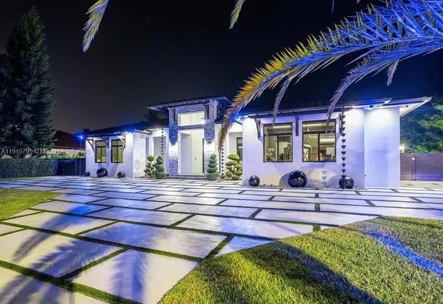 a view of a house with swimming pool