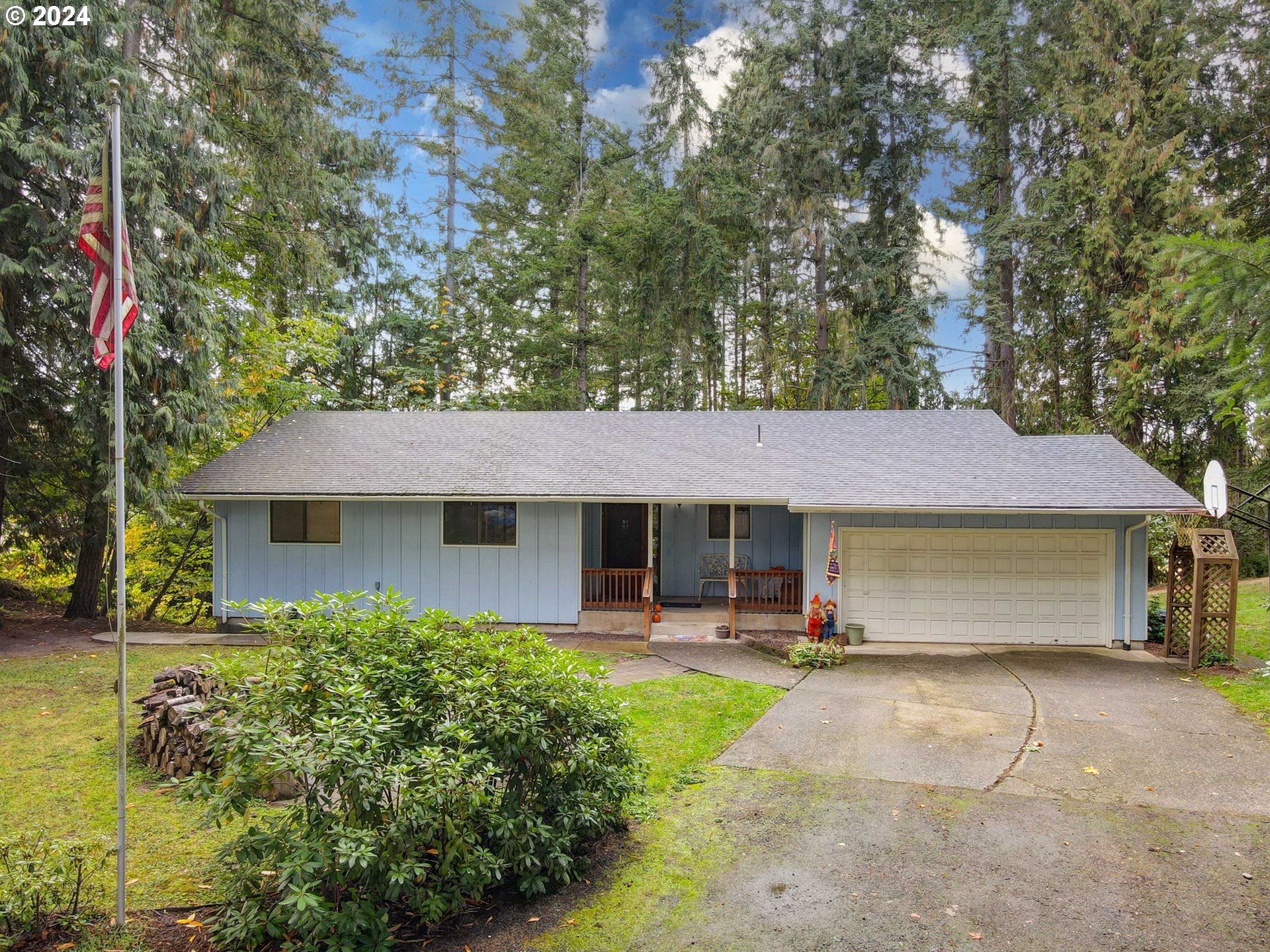 5634 South Whiskey Hill Road Hubbard, OR 97032 - Photo 1 of 48 a view of a house with a patio