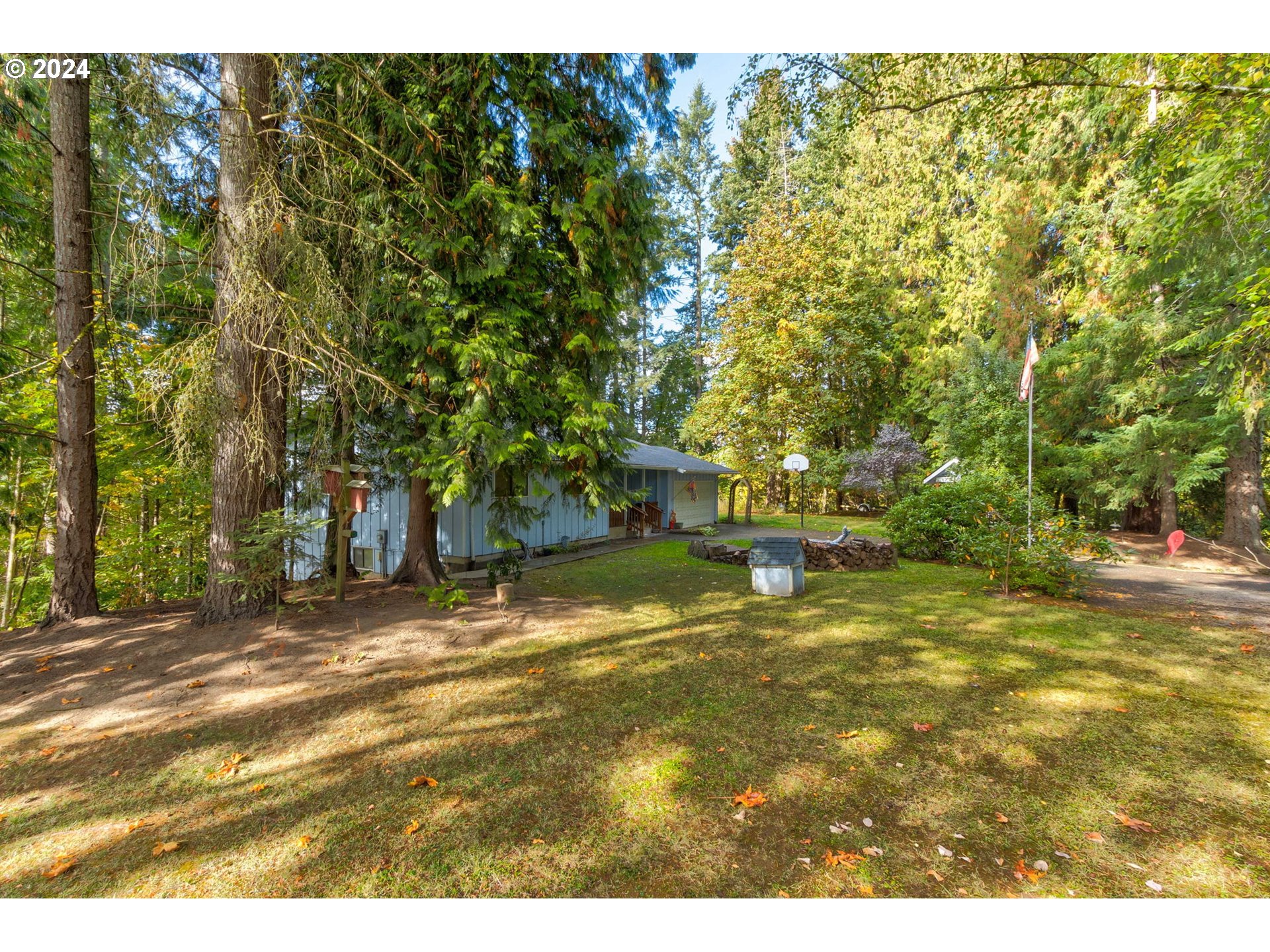 5634 South Whiskey Hill Road Hubbard, OR 97032 - Photo 4 of 48 a view of a trees in a yard
