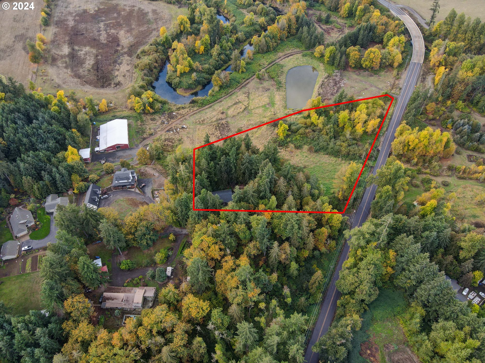 5634 South Whiskey Hill Road Hubbard, OR 97032 - Photo 46 of 48 an aerial view of residential house with outdoor space and trees all around