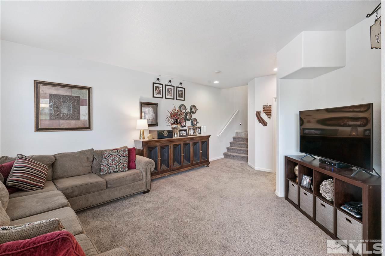 1859 Resistol Drive Reno, NV 89521 - Photo 3 of 33 a living room with furniture and a flat screen tv