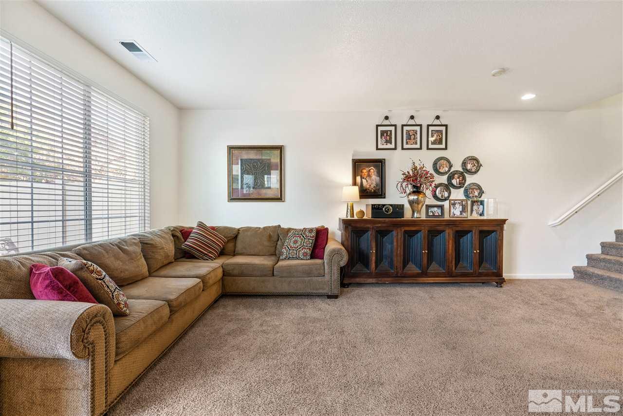 1859 Resistol Drive Reno, NV 89521 - Photo 4 of 33 a living room with furniture and a wooden floor